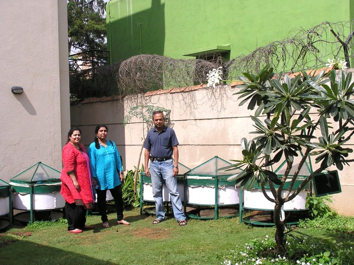 The Prudent Eco Systems Team: (L to R) Vaishali Kerekatte, Latha & Ravindra Karnad. These Marigold composters installed here were from the first batch with a cement container. Now you get steel-bodied Marigold which are more efficient, portable and elegant. 
