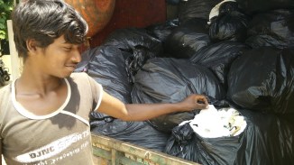 "These bags are full of tissue papers," says this ITC employee who picks up the load from various destinations and brings it to the DWCC.